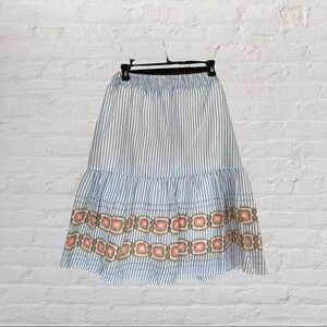 A Calin below the knee skirt